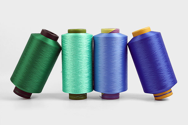 Dimensionsstabilitet er en vigtig egenskab ved polyester DTY (Draw Textured Yarn) garn