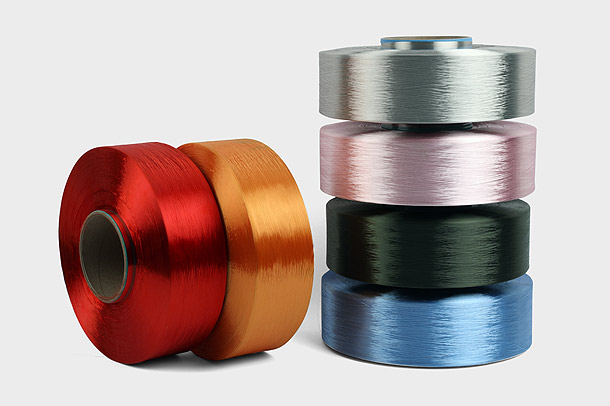 Hvordan påvirker denier-antallet af polyester FDY-garner deres alsidighed og anvendelser i tekstilindustrien?